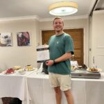 Man with Pudding Club certificate